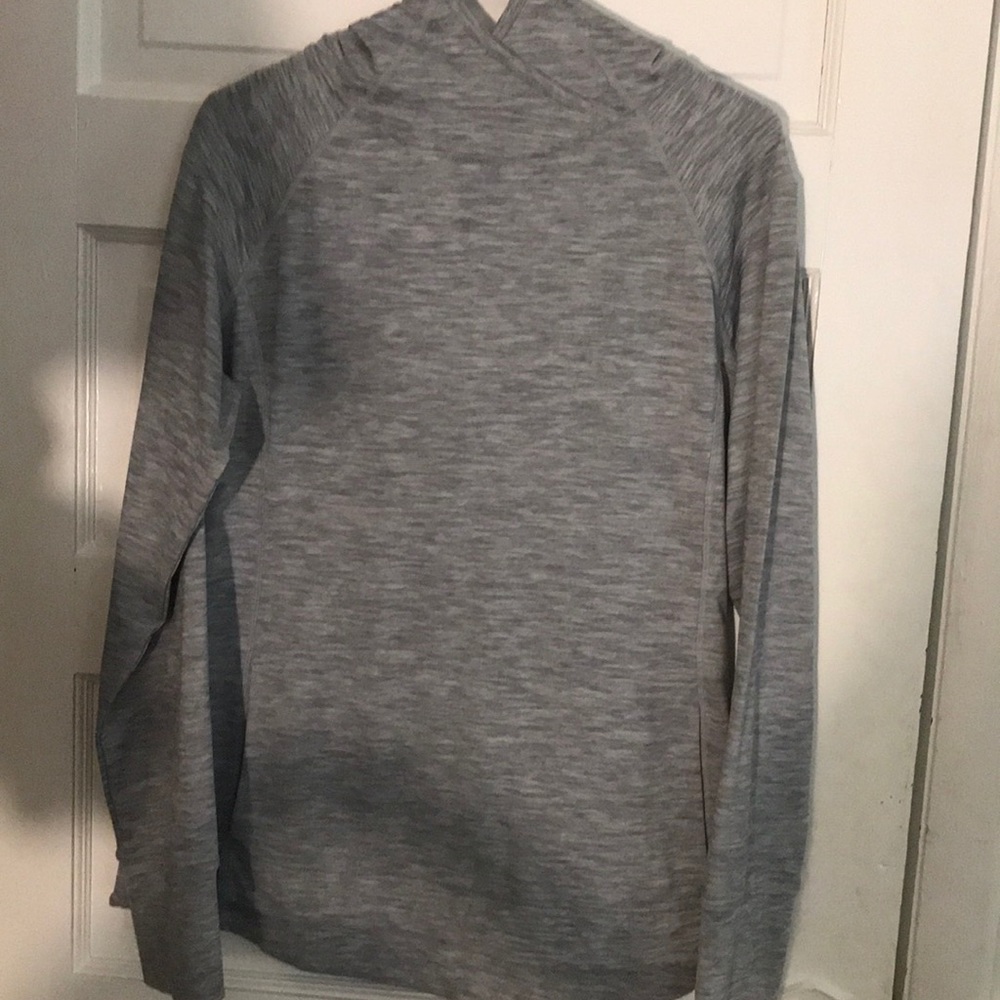 a gray sweater